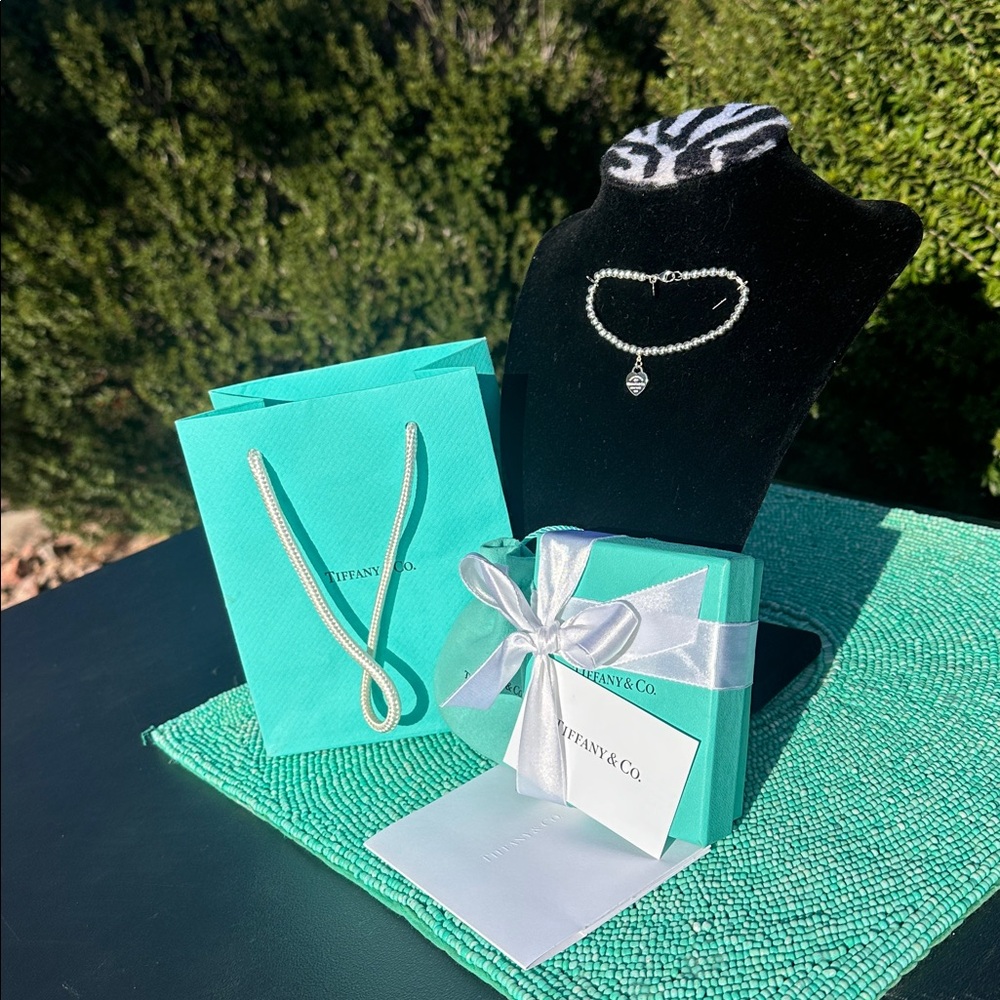 Tiffany & Co. SilverHeartDiamondCharm Bracelet-new/never used-originally packed